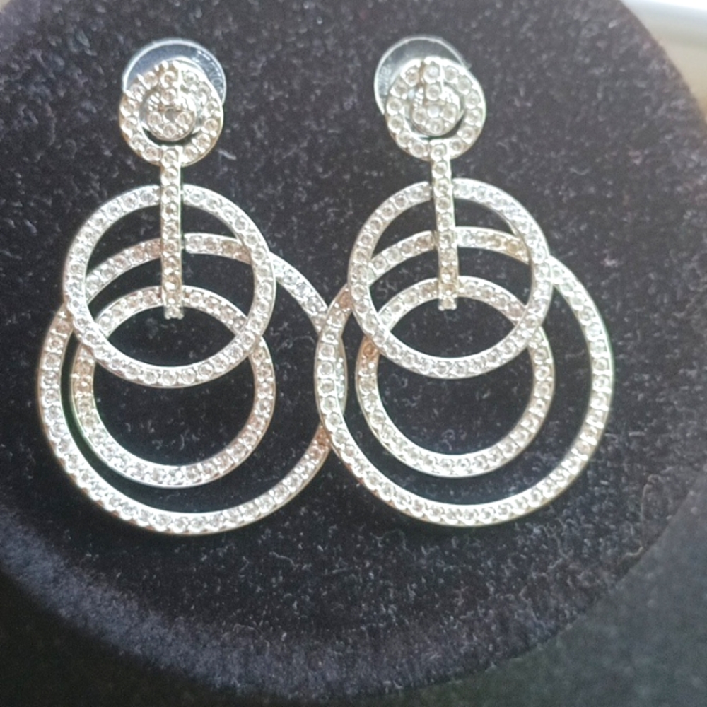 Swarovski Stud rhodium plated white earrings.